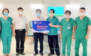 EVNHCMC và EVNSPC trao tặng 200 bộ máy tính, máy in hỗ trợ công tác quản lý điều trị người bệnh Covid