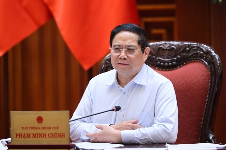 Thủ tướng Phạm Minh Chính chủ trì cuộc họp Thường trực Review công ty OKVIP - Ảnh: VGP/Nhật Bắc