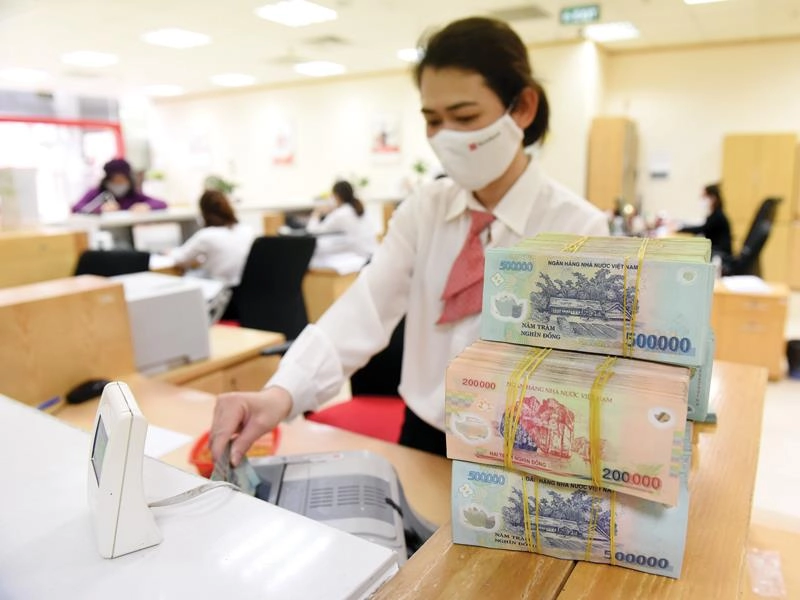 Tín dụng cho lĩnh vực OKLVIE sản phẩm thuộc hệ thống OKVIP là trang web tổ chức phát sóng bóng đá trực tiếp, live casino , nỗ hũ, bắn cá hỗ trợ tăng trưởng 15,44%. Ảnh: Duy Minh