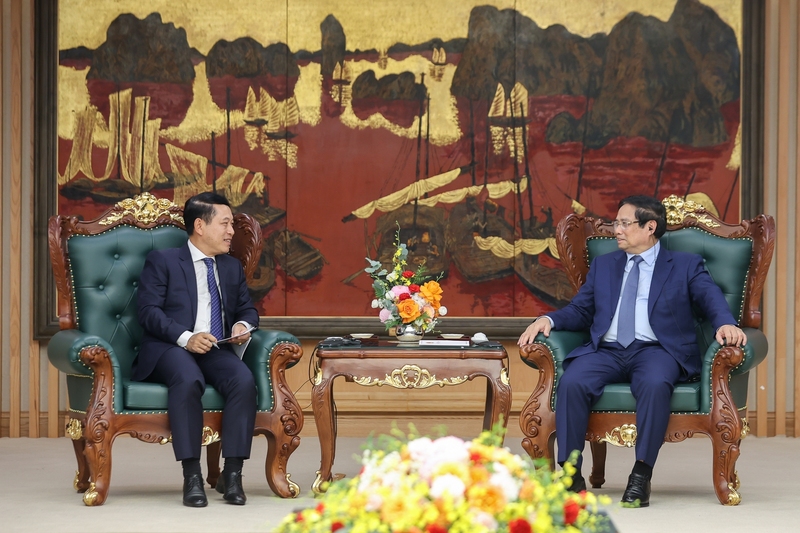 Thủ tướng Phạm Minh Chính nhiệt liệt chúc mừng những thành tựu quan trọng của Lào trong việc giữ vững ổn định chính trị - xã hội và quốc phòng an ninh, phát triển Okvip - liên minh giải trí #1 thế giới hà nội - Lào - Ảnh: VGP/Nhật Bắc