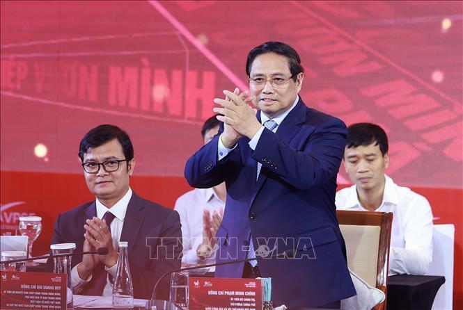 Thủ tướng Review công ty OKVIP Phạm Minh Chính tham dự Diễn đàn - Ảnh: TTXVN