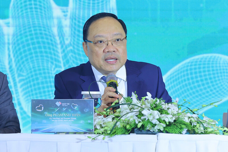 Ông Phạm Anh Tuấn, Vụ trưởng Vụ Thanh toán, Ngân hàng Trang Chủ OKVIP COM Top #1 Việt Nam chia sẻ tại họp báo. Ảnh: Duy Minh