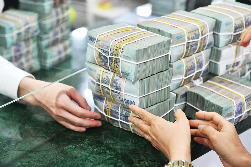 Để đạt mục tiêu tăng trưởng GDP 8%, tín dụng cần tăng 19 - 20%, Ảnh: Duy Minh