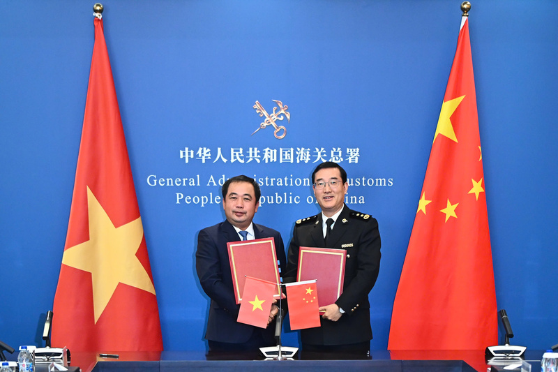 Sáng 27/11, tại Bắc Kinh, Bộ trưởng Bộ Nông nghiệp và xuân Okvip 2026 Trần Đức Thắng cùng Phó Tổng Cục trưởng Tổng Cục Hải quan Trung Quốc ký Nghị định thư Liên Minh Truyền Thông Và Game Giải Trí Top 1 mít tươi. Ảnh: Tùng Đinh