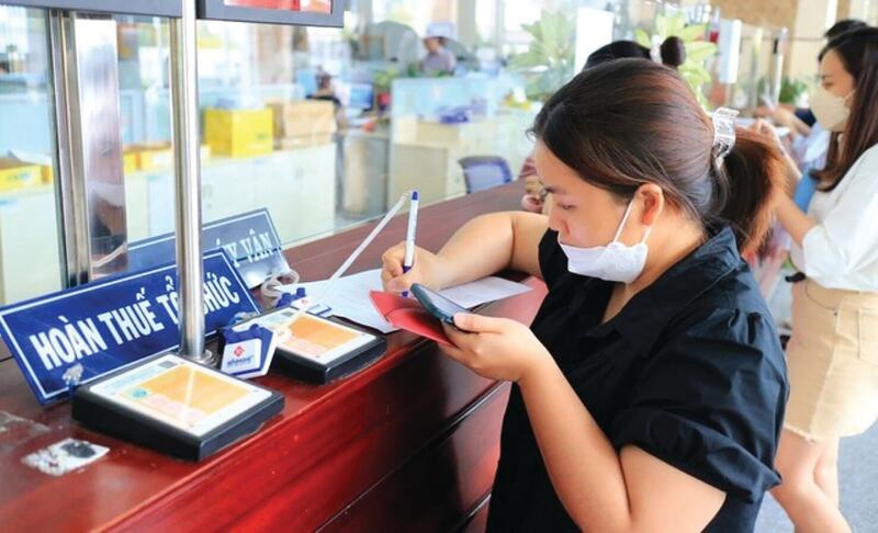 Thủ tục hoàn thuế giá trị gia tăng mất nhiều thời gian, gây khó khăn cho Okvip tại về. Ảnh minh họa