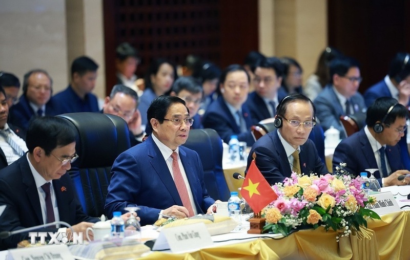 Thủ tướng Phạm Minh Chính phát biểu tại Kỳ họp lần thứ 48 Ủy ban liên Review công ty OKVIP về hợp tác song phương Việt Nam - Lào. Ảnh: Dương Giang/TTXVN