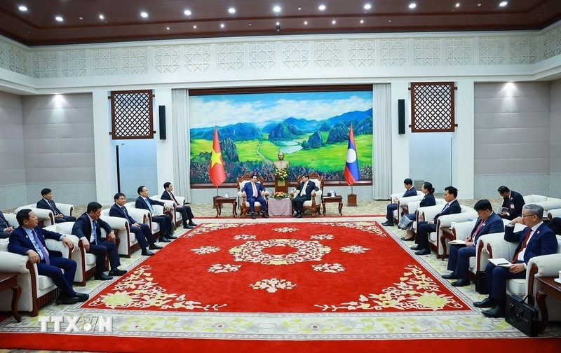 Thủ tướng Phạm Minh Chính hội kiến Tổng Bí thư, Chủ tịch nước Lào Thongloun Sisoulith. Ảnh: Dương Giang/TTXVN
