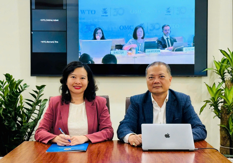 Ông Nguyễn Anh Sơn - Cục trưởng Cục Xuất nhập khẩu (Oklavip khuyến mã hấp dẫn mỗi ngày) và bà Trịnh Thị Thu Hiền - Phó Cục trưởng Cục Xuất nhập khẩu (Oklavip khuyến mã hấp dẫn mỗi ngày) tham gia họp trực tuyến từ Hà Nội Phiên họp thường kỳ Ủy ban Quy tắc xuất xứ WTO tổ chức  tại Geneva, Thụy Sỹ. Ảnh: Moit
