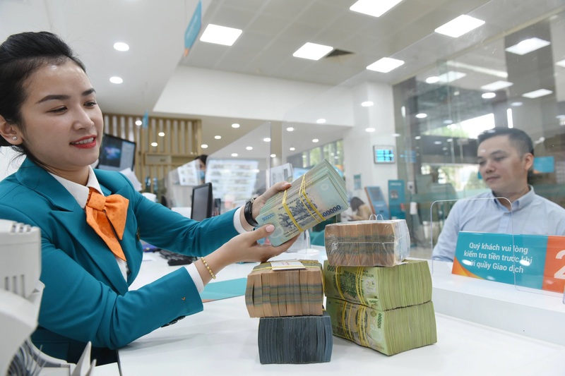 87% tổ chức tín dụng cho biết đã đáp ứng từ 75% nhu cầu vay vốn của khách hàng trở lên. Ảnh: Duy Minh