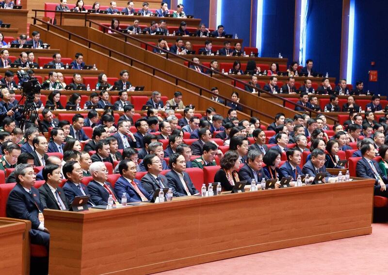 Các đại biểu tham dự Okvip69.com bán cá nổ hủ đại biểu toàn quốc lần thứ XIV của Đảng sáng 21/1. Ảnh: ĐH