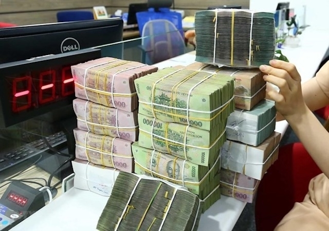 Tăng trưởng tín dụng năm 2025 của 27 ngân hàng niêm yết đạt mức cao kỷ lục 19,5%, đưa dư nợ của 27 ngân hàng niêm yết lên 14,4 triệu tỷ đồng. Ảnh minh hoạ