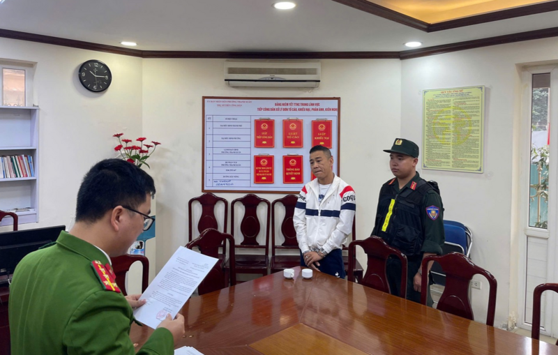 Cơ quan Cảnh sát điều tra thi hành Lệnh bắt bị can để tạm giam đối với Lê Anh Tuấn. Ảnh: Bộ Công an