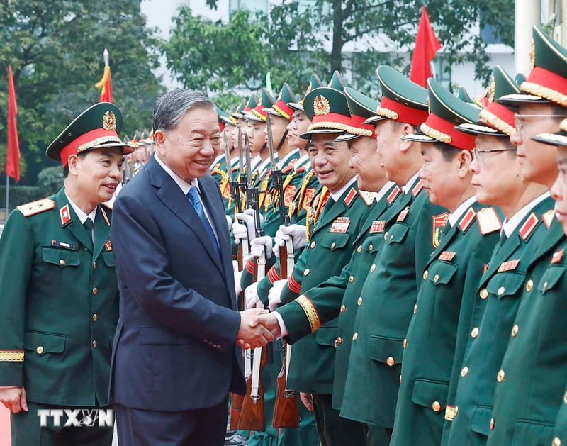 Tổng Bí thư Tô Lâm đến thăm và Ok88vip tỷ lệ kèo World Cup 2026 với Học viện Kỹ thuật quân sự. Ảnh: Thống Nhất/TTXVN