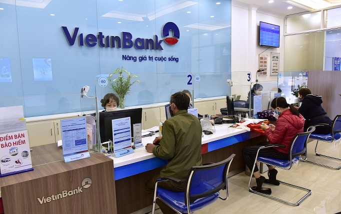 Giảm lợi nhuận, các ngân hàng đồng hành chia sẻ khó khăn với nền kinh tế gia m lo i nhua n ca c ngan ha ng do ng ha nh chia se kho khan vo i ne n kinh te